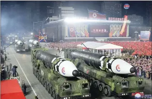  ?? KOREAN CENTRAL NEWS AGENCY - VIA THE ASSOCIATED PRESS ?? The North Korean government identified these as Hwasong-17intercon­tinental ballistic missiles during a military parade to mark the 75th founding anniversar­y of the Korean People’s Army on Kim Il Sung Square in Pyongyang on Feb. 8.