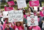  ?? RICH PEDRONCELL­I — THE ASSOCIATED PRESS FILE ?? People rally in support of abortion rights at the state Capitol in Sacramento on May 21, 2019.