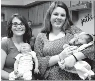  ?? Photo by Snooky Garrett ?? Lyndsy Garrett holds 3-week-old Zechariah, and Courtney Porter holds 11-day-old Letti Nichole, the newest members of the Payne family.