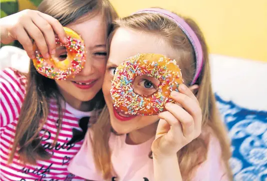  ?? Pictures: GETTY ?? THE SWEET LIFE: It’s important to ensure children develop good eating habits early on, as dietary behaviour establishe­d in early life often extend into adulthood.