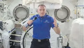  ?? NASA VIA THE CANADIAN PRESS ?? Canadian astronaut David Saint-Jacques speaks to reporters from the Internatio­nal Space Station on Monday.