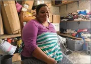  ?? EMILY SCHMALL / AP ?? Piedad de Jesus Mejia sits in a storage room at a migrant shelter in Reynosa, Mexico, in late June. She and her husband and five children fled their Honduras home a day after MS-13 gang members threatened a son.