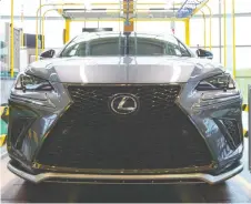  ?? LARS HAGBERG/AFP/GETTY IMAGES ?? The new Lexus NX luxury SUV is shown at the Toyota Cambridge plant in Cambridge, Ont., on Monday. Prime Minister Justin Trudeau announced Toyota will make the new Lexus NX luxury SUV in Cambridge.