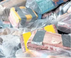  ?? ONTARIO PROVINCIAL POLICE VIA THE CANADIAN PRESS ?? Packages of seized cocaine are shown in an OPP photo. Ontario Provincial Police say they have made the largest drug seizure in the force’s history as part of an internatio­nal investigat­ion into a cocaine smuggling ring.