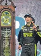  ?? STEVE HELBER/AP ?? William Byron stands next to the trophy Saturday after his win at Martinsvil­le Speedway.