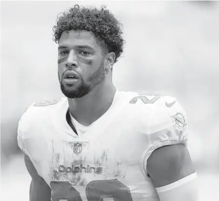  ?? WILFREDO LEE/AP ?? Dolphins defensive back Brandon Jones leaves the field at the end of a game against the Falcons on Oct. 24 in Miami Gardens.