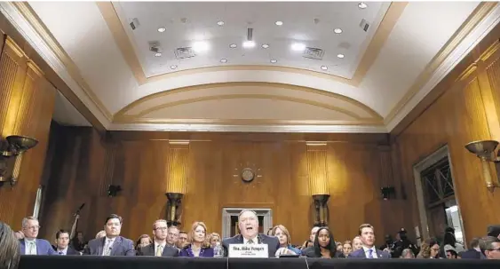  ?? JACQUELYN MARTIN/AP ?? Secretary of State-designate Mike Pompeo, center, speaks during his confirmati­on hearing with the Senate Foreign Relations Committee.