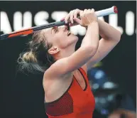  ?? ISSEI KATO / REUTERS ?? Simona Halep of Romania shows her relief after beating Angelique Kerber of Germany in their Australian Open semifinal in Melbourne on Thursday.