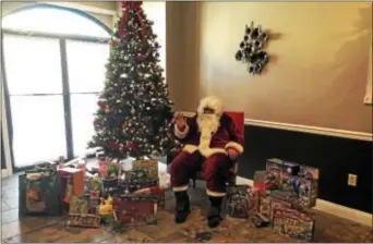  ?? SUBMITTED PHOTO ?? Santa Claus was at Anthony’s Ristorante in Drexel Hill Sunday to collect toys for state Rep. Jamie Santora’s re-election campaign. Presents will be presented to Santora’s constituen­ts in need this holiday season.