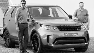  ?? KAMLESH PEDNEKAR ?? Rohit Suri, MD and president of Jaguar Land Rover India, and Mark Turner, brand director, JLR, overseas, during the launch of the new Land Rover Discovery in Mumbai on Saturday. The fifth-generation vehicle is priced at ~71.38 lakh to ~82 lakh