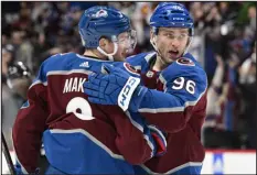  ?? ANDY CROSS — THE DENVER POST ?? The Avalanche’s Mikko Rantanen, right, celebrates his goal against the Ducks with Cale Makar in the first period at Ball Arena on Jan. 26.