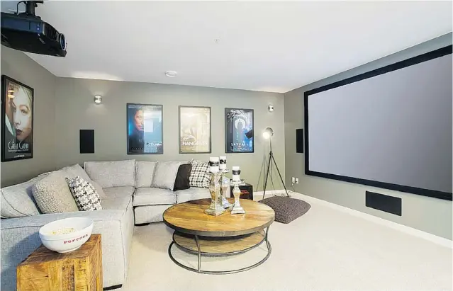  ??  ?? Basements can be finished if buyers so choose. An entertainm­ent room is among the options for homeowners.