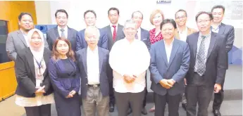  ??  ?? Saifuddin (fourth from left) with Sipaun (third from left), Anthony (second from right), IDS deputy CEO Chong Vun Then (furthest right), IDS board of directors, board of advisors and senior management team.