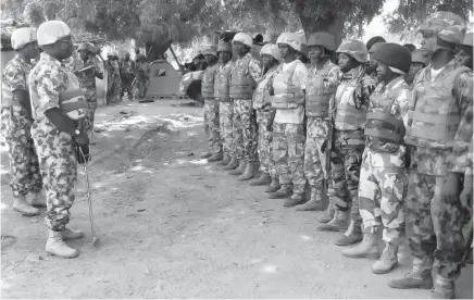  ??  ?? Theater Commander, Operation Lafiya Dole, Maj.Gen. Yushau Abubakar, addresses troop of the 114 Task Battalion in Bitta, near Sambisa Forest in Borno yesterday.
