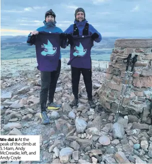  ??  ?? We did it At the peak of the climb at 5.14am, Andy Mccreadie, left, and Andy Coyle