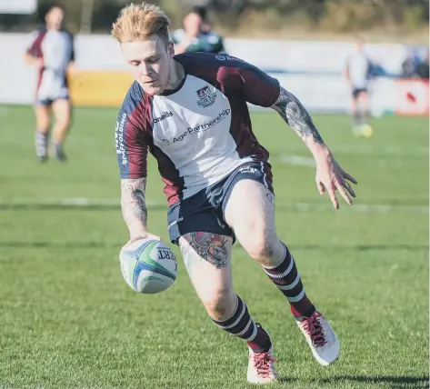  ??  ?? Jack Anderson touches down in Scarboroug­h RUFC’s superb 50-43 home win against York on Saturday PICTURES BY ANDY STANDING