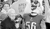  ?? TIM TAI/TNS ?? Eagles DE Chris Long celebrates with a German Shepherd mask Sunday after the NFC Championsh­ip game.