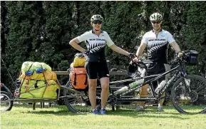  ?? PHOTOS: BRENT AND CLAIRE RURU ?? Wearing New Zealand-branded tops while cycling through Canada scored them multiple impromptu homestays.