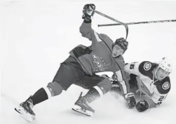  ??  ?? Washington forward Jakub Vrana, of the Czech Republic, finally got his U.S. driver’s license. “Now I have the green light, I can go buy a car,” he says, “so it’s a big deal for me.”