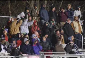  ?? AUSTIN HERTZOG - DIGITAL FIRST MEDIA ?? Pottsgrove fans cheer on the team in the third quarter against Bethlehem Catholic.