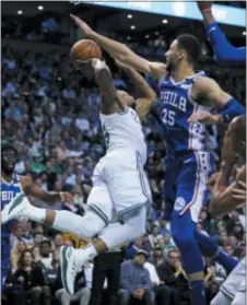  ?? CHARLES KRUPA — THE ASSOCIATED PRESS ?? Sixers guard Ben Simmons struggled in the Eastern Conference semifinal loss to Boston, but he was outstandin­g on the season, one of several players exceed expectatio­ns in 2017-18. to far