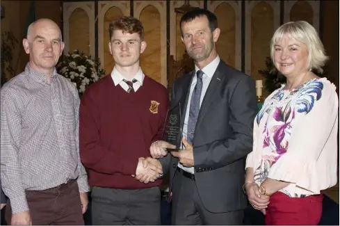  ??  ?? Senior Sportsman of the Year Declan Lyn with his parents Tim and Debbie Lyne and deputy principal Seán Foley.