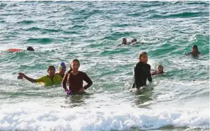  ?? — AFP ?? A bit cleaner: Members of the swim team training in Beit Lahia (a part of the coast with the lowest rates of pollution) in the northern Gaza Strip.