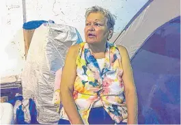  ??  ?? Carol Aldape, 68, is one of the homeless who would be displaced by a constructi­on project on Lake Shore Drive at the Wilson Avenue viaduct, where she lives in a tent.| MARK BROWN/ SUN- TIMES