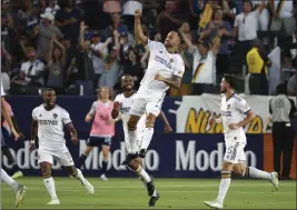  ?? PHOTO BY RAUL ROMERO JR. ?? GALAXY
Galaxy midfielder Victor Vazquez leaps in celebratio­n after scoring a goal against the Vancouver Whitecaps during the first half on Saturday at Dignity Health Sports Park.