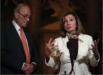  ?? Associated Press ?? ■ House Speaker Nancy Pelosi of Calif., and Senate Minority Leader Sen. Chuck Schumer of N.Y., speak to reporters Thursday on Capitol Hill in Washington.