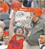  ?? MATT YORK/THE ASSOCIATED PRESS ?? Gonzaga’s Johnathan Williams dunks during practice Friday in Glendale, Ariz.