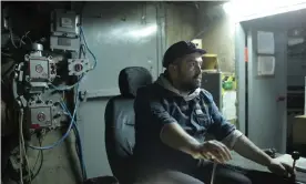  ?? Photograph: Adrian Catu/The Guardian ?? Sebastian Tirintică operating machinery inside the mine.