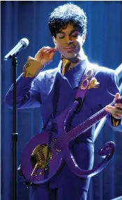  ?? ( Richard Hartog/ Los Angeles Times/ TNS) ?? PRINCE PERFORMS ‘ Purple Rain’ in Los Angeles in 1987.