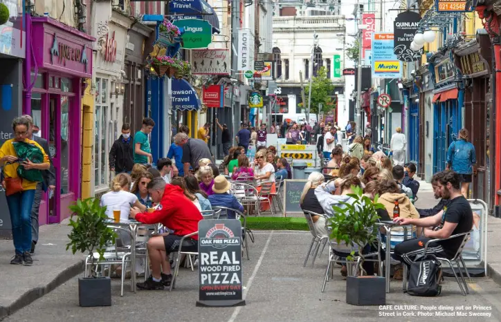  ??  ?? CAFE CULTURE: People dining out on Princes Street in Cork. Photo: Michael Mac Sweeney