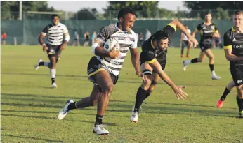  ?? Chris Whiteoak / The National ?? Panapasa Qeruqeru Nasove runs with the ball during LAR Speranza 22’s win over Zastawa. Many of the Speranza players won Olympic gold with Fiji in 2016