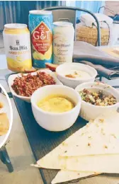  ?? ?? Pinoy Mezze: Turmeric Calamansi Hummus, Pinoy Salad a la Tabbouleh, Whipped Magnolia Milky White in Greek Yogurt, and Purefoods Corned Beef Salpicao