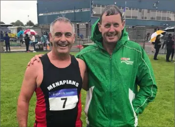  ??  ?? Jimmy McDonald, winner of the 3,000m walk, with Menapians team manager Conall Gaffney.