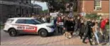  ?? RECORD FILE PHOTO ?? Hundreds of protesters break through a fence set up by administra­tors at Rensselaer Polytechni­c Institute to contain an Oct. 13 demonstrat­ion against what students see as an attempt by the college administra­tion to take over the student-run Rensselaer...
