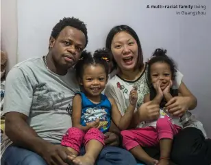  ??  ?? A multi-racial family living in Guangzhou