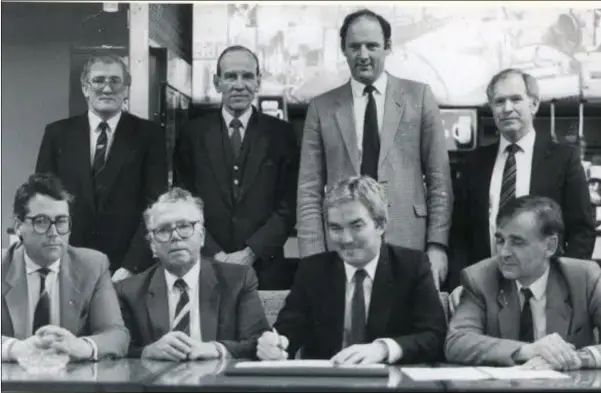  ??  ?? At the signing of the Harp Lager brewhouse civil contract in 1985, back-row, B. Byrne, D. Moffitt, M. Corry, J. Brown; front-row, B. Duffy, B. Duffy Snr., J. McClean, B. Wilson.