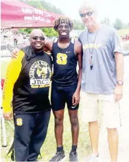  ?? ?? Starkville High School’s Sterling Scott competes in the triple jump, left photo, and has received support from his coaches throughout his career. (Photo by @Stkjackets, for Starkville Daily News)