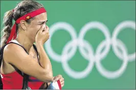  ?? VADIM GHIRDA / ASSOCIATED PRESS ?? It’s an emotional moment for tennis star Monica Puig at Rio de Janeiro as she becomes Puerto Rico’s first Olympic gold medalist in any sport.