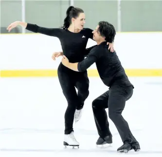  ?? DAVE ABEL/ TORONTO SUN ?? Olympic champions Tessa Virtue and Scott Moir skate at the Hershey Centre in Mississaug­a on Wednesday.