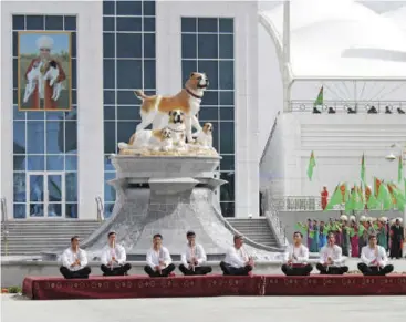  ??  ?? Dog day ... Musicians perform during celebratio­ns last week for the national Turkmen Horse Day and the Turkmen Shepherd Dog Day near Ashgabat, Turkmenist­an.