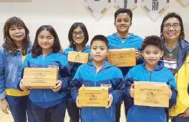  ??  ?? Most Outstandin­g Swimmer awardees Micaela Jasmine Mojdeh, Kyla Soguilon, Marc Bryan Dula, Rio Lorenzo Malapitan and Trump Christian Luistro with Philippine Swimming League president Susan Papa (right) and secretary general Maria Susan Benasa (left).