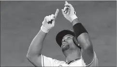  ?? JAYNE KAMIN-ONCEA/GETTY ?? Angels’ Albert Pujols points to the sky after hitting the 662nd home run of his career.