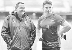  ??  ?? New Zealand All Blacks rugby coach Steve Hansen (left) chats with New Zealand All Blacks rugby captain Beauden Barrett during the captain’s run at Twickenham in south west London on the eve of the rugby union match of the Vista 2017 All Blacks Northern...