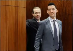  ?? AP PHOTO/PAT SuLLIVAN ?? In this 2016 file photo, David Daleiden (right) leaves a courtroom with attorney Jared Woodfill after a hearing in Houston.