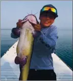  ?? COURTESY PHOTO ?? Eleven-year-old Hyden Brown of Kelseyvill­e caught this 37-pound catfish last week out of Clear Lake.