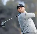  ?? DENIS POROY/AP ?? Spaniard Jon Rahm tees off during the third round Saturday at Torrey Pines.